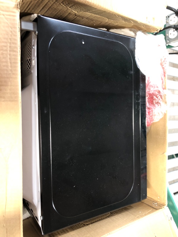 Photo 6 of **PARTS ONLY, EXTREME DAMAGE, NON-FUNCTIONAL** COMFEE' EM720CPL-PMB Countertop Microwave Oven, 0.7cu.ft, 700W, Black Microwave