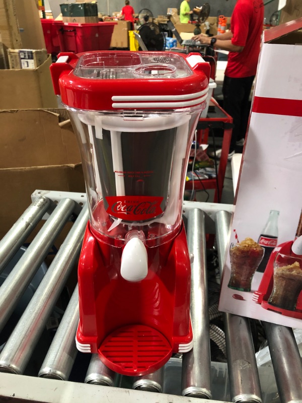 Photo 2 of **missing parts**used**
Nostalgia Coca-Cola 32-Ounce Retro Slush Drink Maker Slushie Machine for Home, Red