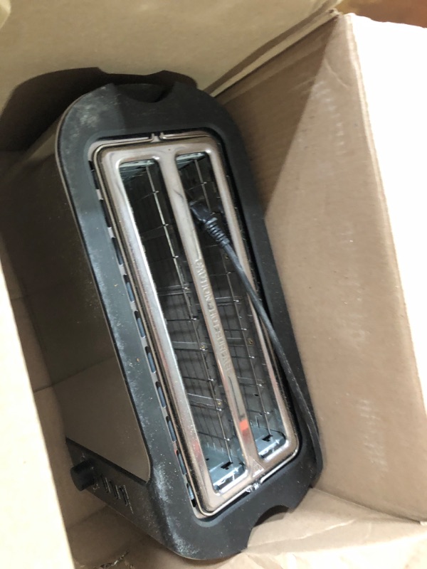 Photo 2 of * USED * 
Elite Gourmet ECT-3100 Long Slot 4 Slice Toaster, Reheat, 6 Toast Settings, Defrost, Cancel Functions, Built-in Warming Rack, Extra Wide Slots for Bagels & Waffles, Stainless Steel & Black