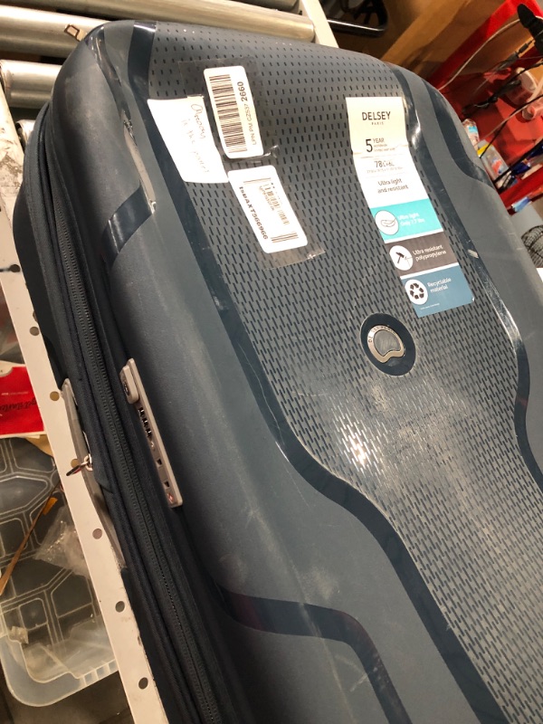 Photo 1 of * DAMAGED * 
DELSEY Paris Clavel Hardside Expandable Luggage with Spinner Wheels, Blue Jean, Checked-Medium 25 Inch Checked-Medium 25 Inch BLUE JEAN