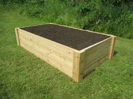 Photo 1 of   Rectangular Wood Raised Garden Bed - Elevated Planter Box for Flower, Vegetable, and Herb Gardening