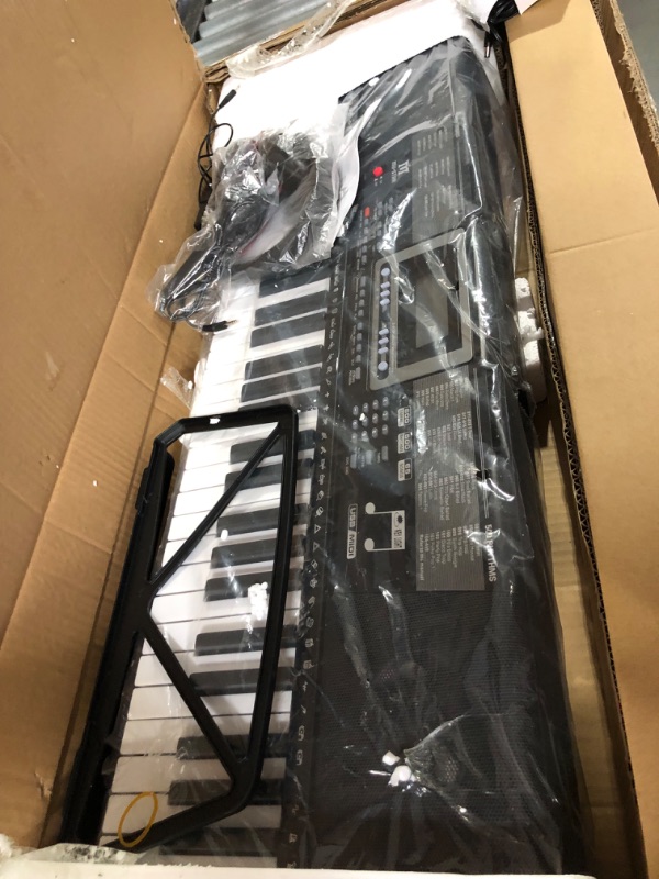 Photo 1 of **WAS UNABLE TO TEST** MUSTAR 61 Key Piano Keyboard, Learning Keyboard Piano