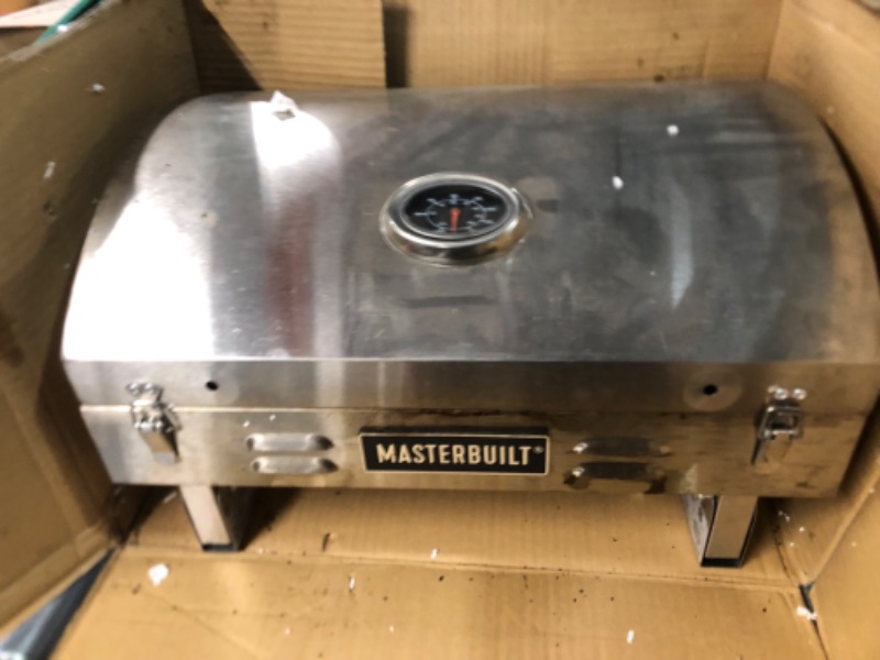 Photo 4 of **** THIS ITEM IS EXTREEMLY USED BUT IN GOOD CONDITION  NEEDS CLEANING Masterbuilt MB20030819 Portable Propane Grill, Stainless Steel New Version Propane Grill