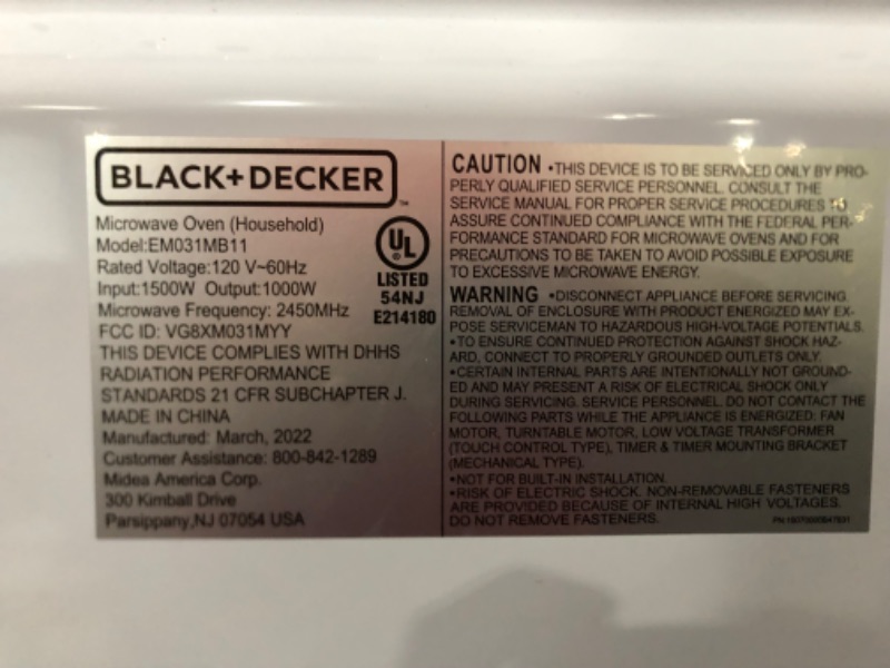 Photo 3 of * dents on the bottom, not in original box * tested works *
BLACK+DECKER EM031MB11 Digital Microwave Oven with Turntable Push-Button Door, 