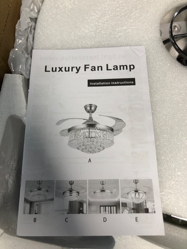 Photo 2 of * item does not work * sold for parts or repair *
Crystal Ceiling Fans with Lights,42 Inch LED 3 Color Remote Control Retractable Invisible Blades 3 Speeds 