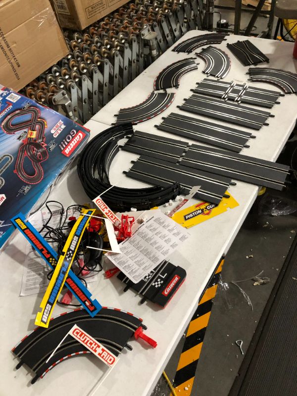 Photo 4 of **MISSING CARS AND POSSIBLY OTHER PARTS** Carrera GO!!! 62477 Disney Pixar Cars Neon Nights Electric Slot Car Racing Kids