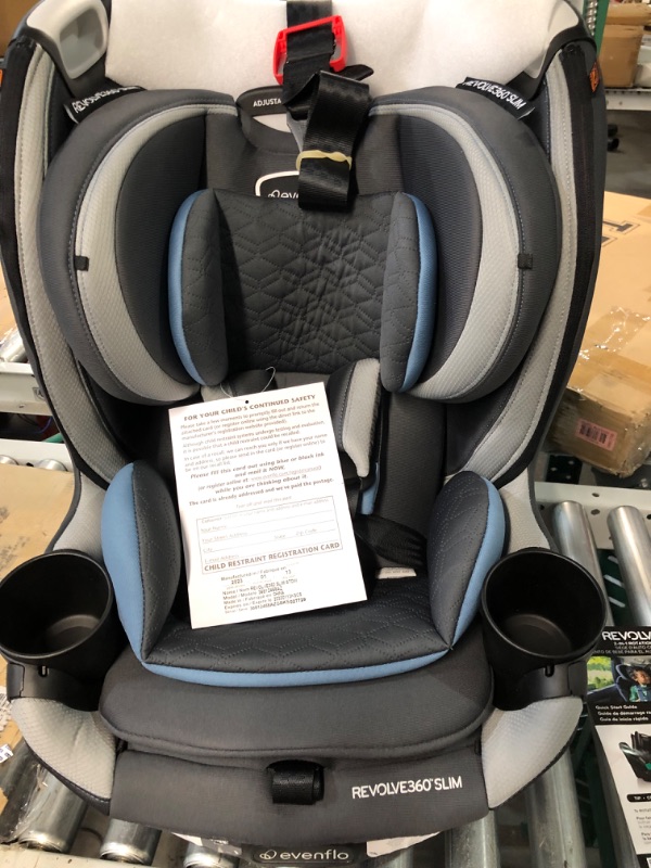 Photo 3 of Evenflo Revolve360 Slim 2-in-1 Rotational Car Seat with Quick Clean Cover (Stow Blue) Revolve Slim Quick Clean Cover Stow Blue