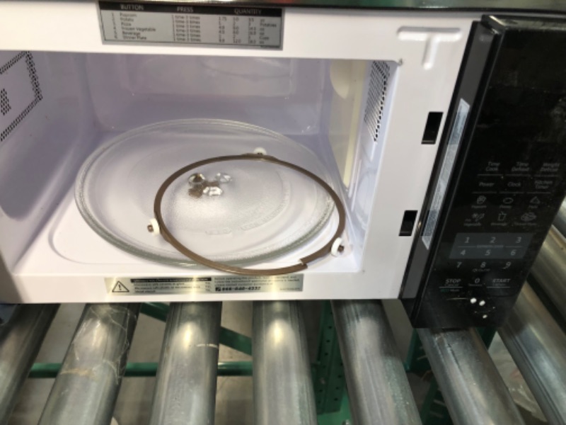 Photo 2 of * item used and damaged * see images *
EM720CPL-PMB Countertop Microwave Oven with Sound On/Off, ECO Mode 