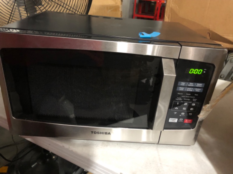 Photo 2 of *MISSING LEGS-MINOR DENTS*
TOSHIBA EM925A5A-SS Countertop Microwave Oven, 