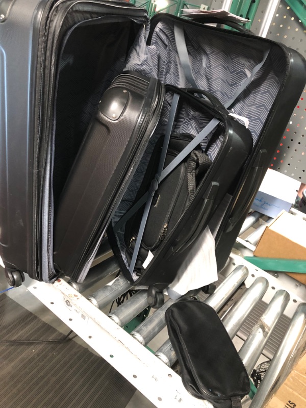 Photo 3 of * item used and damaged * handle does not go down * see images for damage *
Travelers Club Midtown Hardside 4-Piece Luggage Travel Set, Black 4-Piece Set Black