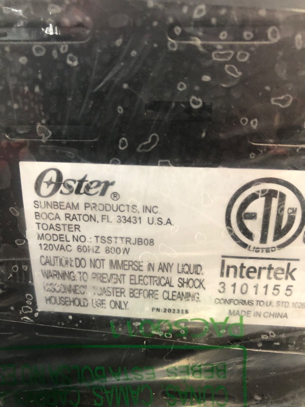 Photo 1 of Oster 2-Slice Toaster with Advanced Toast Technology, Candy Apple Red