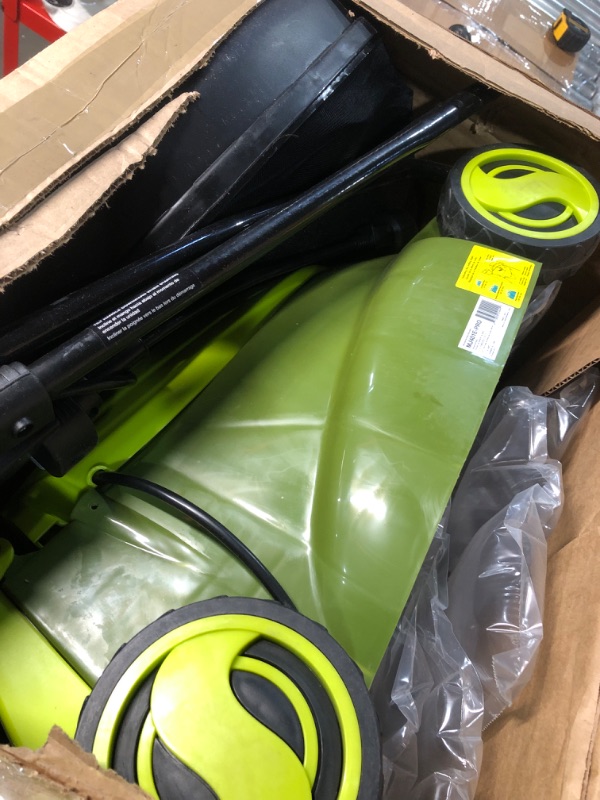 Photo 2 of * item used *
Sun Joe MJ401E-PRO 13 Amp Electric Lawn Mower w/Side Discharge Chute, 14", Green & SBJ597E 6-Amp 155 MPH Electric Leaf Blower, Green