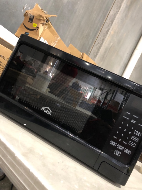 Photo 2 of * door wont open * sold for parts * repair *
Walsh WSCMS311BK-10 Countertop Microwave Oven, 6 Cooking Programs LED Lighting Push Button,