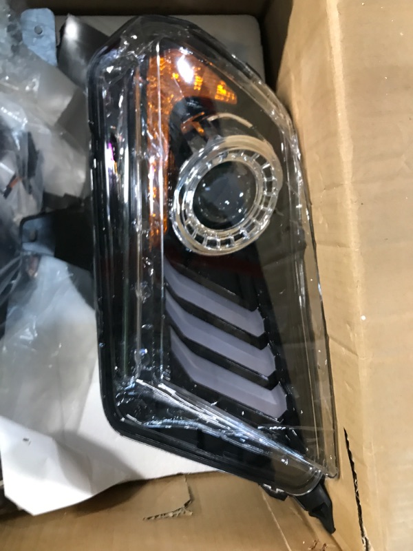 Photo 2 of * item used * broken bracket * see images *
ROXX Headlights Assembly for 2010 2011 2012 Ford Mustang, High Low Beam Projector Headlights w/ S550 Style LED DRL,