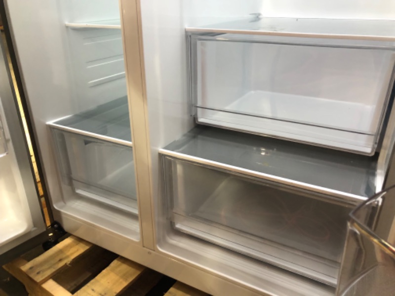 Photo 7 of 27 cu. ft. Side-by-Side Refrigerator with Smooth Touch Ice Dispenser MODEL #: LRSXS2706V SERIAL #: 212MRQKK0R860