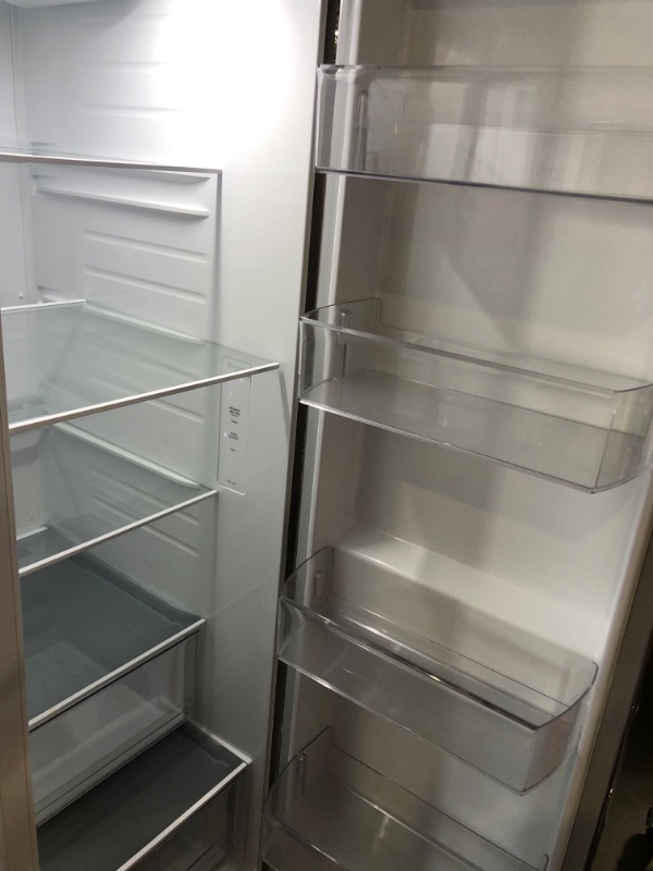 Photo 6 of 27 cu. ft. Side-by-Side Refrigerator with Smooth Touch Ice Dispenser MODEL #: LRSXS2706V SERIAL #: 212MRQKK0R860