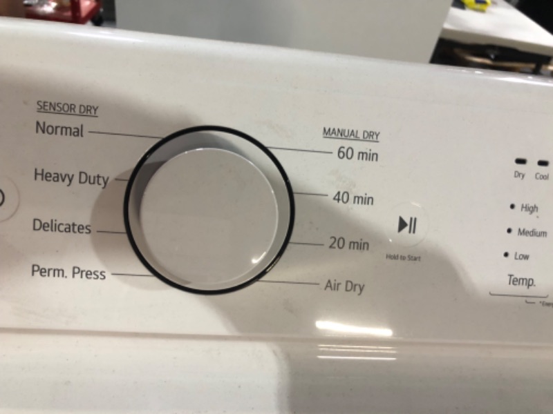 Photo 3 of *MINOR DENT SEE LAST PHOTO*
7.3 cu. ft. Ultra Large Capacity Rear Control Electric Energy Star Dryer with Sensor Dry MODEL #: DLE6100W / SERIAL #: 305KWJU87628