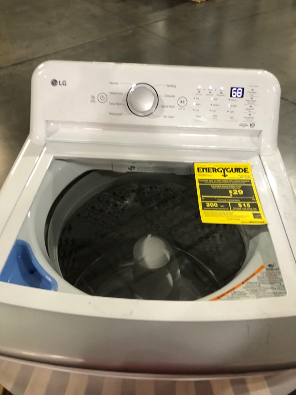 Photo 6 of *MINOR SCRATCH SEE LAST PHOTO*
4.8 cu. ft. Mega Capacity Top Load Washer with 4-Way™ Agitator & TurboDrum™ Technology MODEL #: WT7155CW SERIAL #: 308TNHM1M481