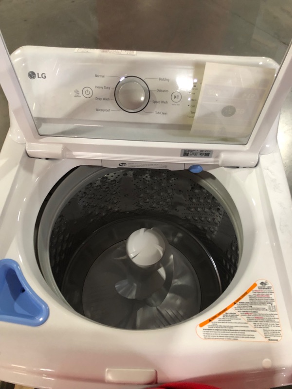 Photo 7 of *MINOR SCRATCH SEE LAST PHOTO*
4.8 cu. ft. Mega Capacity Top Load Washer with 4-Way™ Agitator & TurboDrum™ Technology MODEL #: WT7155CW SERIAL #: 308TNHM1M481