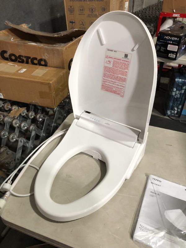 Photo 7 of ***UNTESTED - SEE NOTES***
TOTO SW3084#01 WASHLET C5 Electronic Bidet Toilet Seat with PREMIST and EWATER+ Wand Cleaning