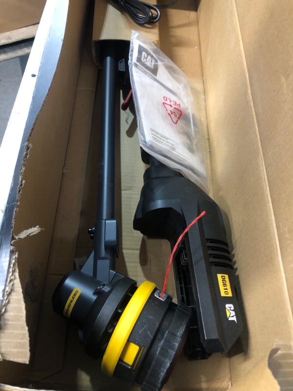 Photo 2 of **BATTERY DOESN'T CHARGE**
Cat DG610 60V 15” Brushless String Trimmer Cordless with Dual Line Bump Feed Head, Edger 