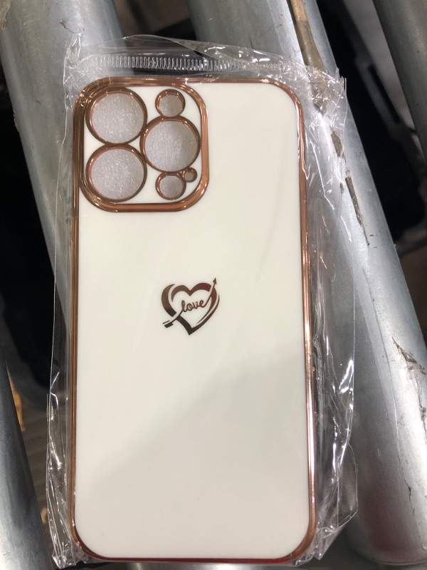 Photo 1 of IPHONE 13 PRO CASE. WHITE LOVE HEARTS