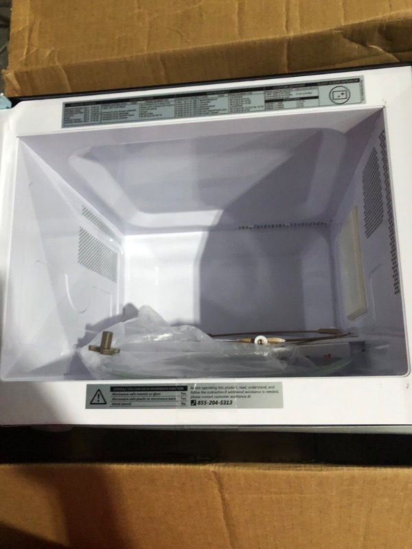 Photo 5 of **PARTS ONLY, NON-FUNCTIONAL** TOSHIBA EM925A5A-SS Countertop Microwave Oven, 0.9 Cu Ft With 10.6 Inch Removable Turntable, 900W, 6 Auto Menus, Mute Function