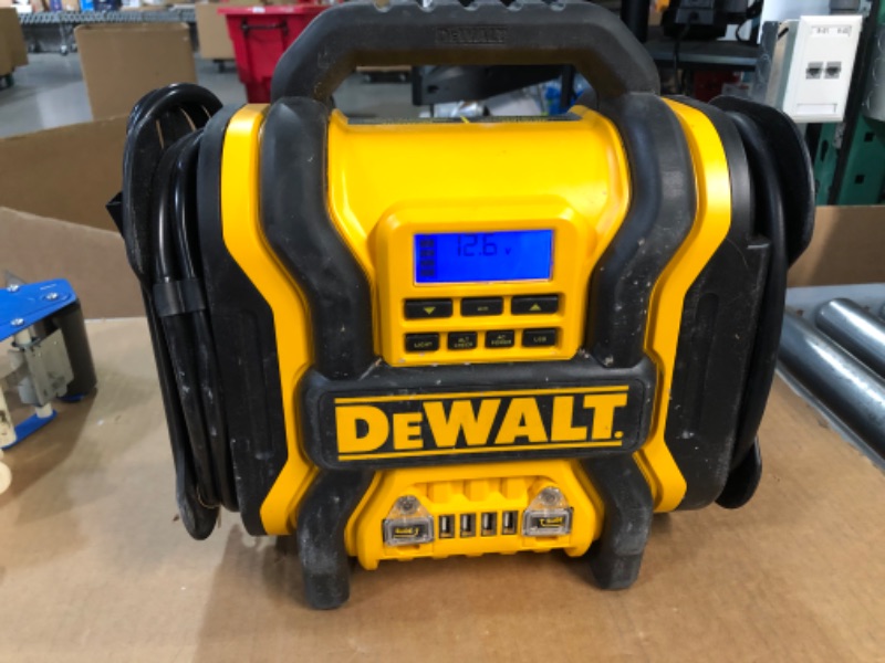 Photo 4 of DEWALT DXAEPS14 1600 Peak Battery Amp 12V Automotive Jump Starter/Power Station with 500 Watt AC Power Inverter, 120 PSI Digital Compressor, and USB Power , Yellow