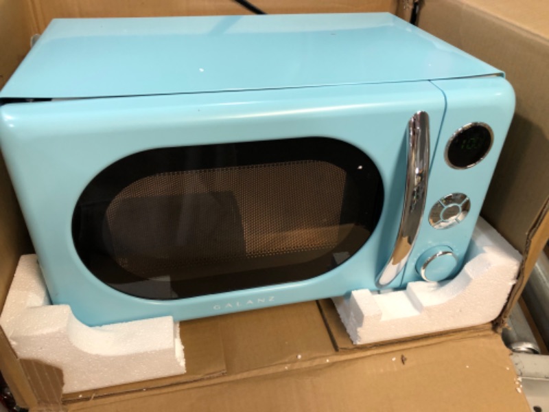 Photo 1 of **DAMAGED**Galanz GLCMKA07BER-07 Retro Microwave Oven, LED Lighting, Pull Handle Design, Child Lock, Bebop Blue, 0.7 cu ft Blue .7 cu ft Classic