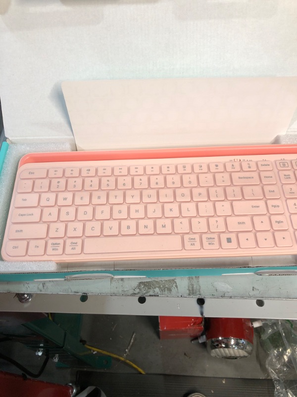 Photo 2 of Gotying Wireless Bluetooth Keyboard with Number Pad, 2 in 1 Wireless & Bluetooth Multi-Device Tablet Full Size Keyboard for ipad,Phone, iOS, Android, Mac and Windows (Pink)