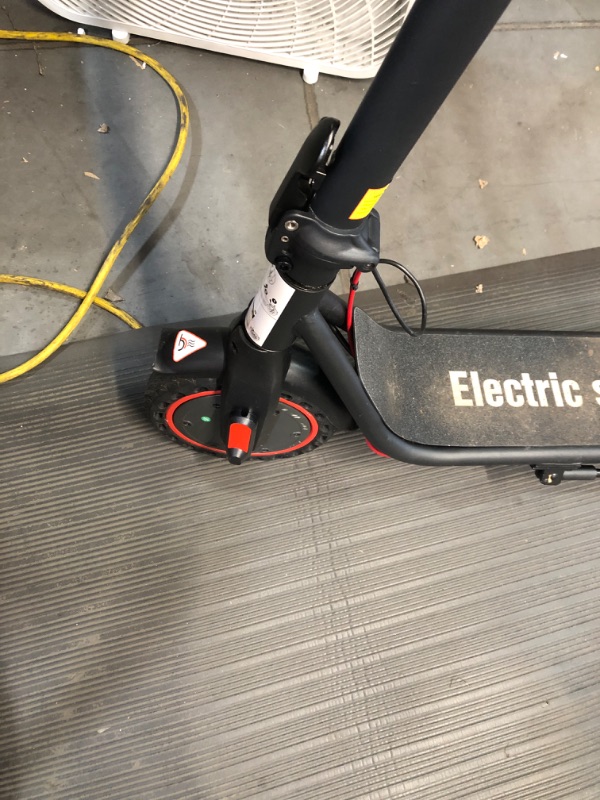 Photo 2 of * USED * 
Electric Scooter 450W Powerful Motor,19mph Speed and 8.5” Solid Tires,Anti-Theft Lock,Wide Deck Portable & Foldable Scooters for Adults