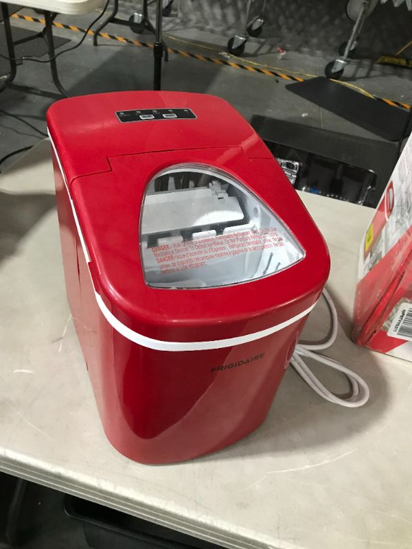 Photo 2 of ***UNTESTED - SEE NOTES***
Frigidaire EFIC108-RED Compact Ice Maker Red Ice Maker