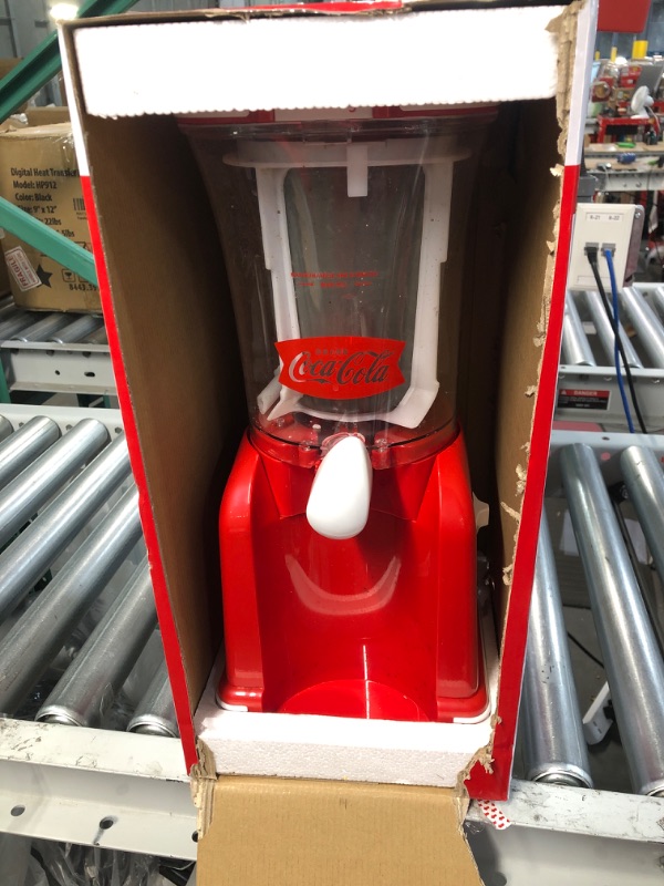 Photo 2 of **SEE NOTES**
Nostalgia Coca-Cola 32-Ounce Retro Slush Drink Maker Slushie Machine for Home, Red