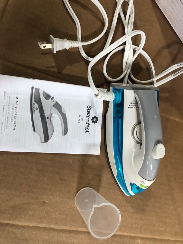 Photo 2 of Steamfast SF-710 Mini Steam Iron, White, Non-Stick Sole Plate, Foldable Handle