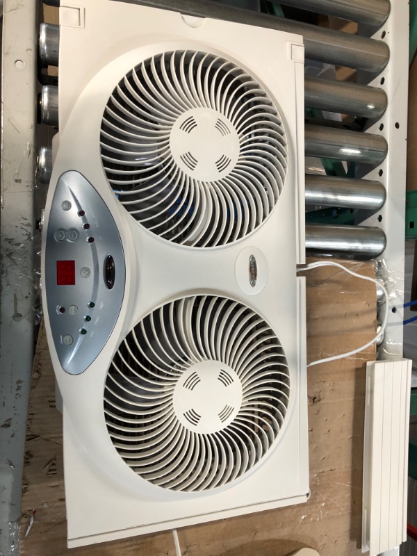 Photo 3 of [Like New] Bionaire Window Fan with Twin 8.5-Inch Reversible Airflow Blades and Remote Control, White