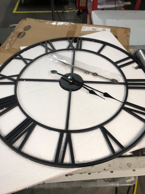 Photo 1 of 1st owned Large Wall Clock Metal Retro Roman Numeral Clock, Modern Round Wall Clocks Almost Silent , Easy to Read for Living Room/Home/Kitchen/Bedroom/Office/School Decor (Black, 24 Inch) Black 24 Inch