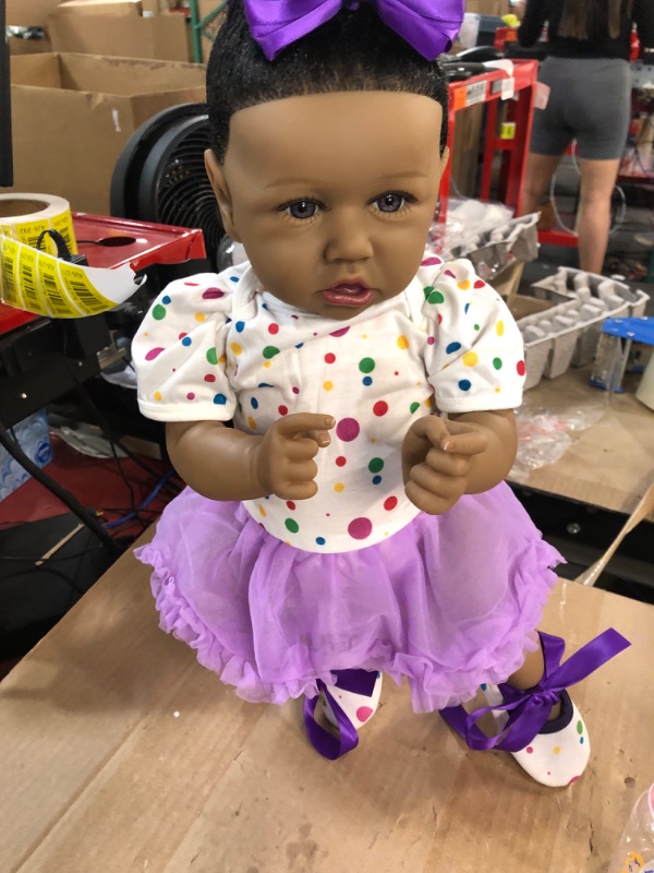 Photo 1 of HOOMAI Lifelike Reborn Baby Dolls with Soft Body African American Realistic Girl Doll 22.8 Inch Best Birthday Gift Set Aria