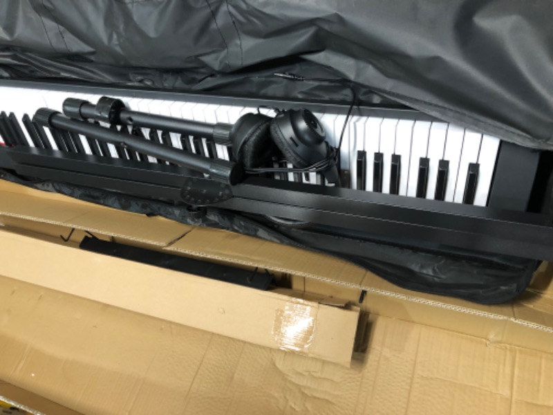 Photo 8 of **USED/SEE NOTES**Starfavor Piano Keyboard 88 Keys Keyboard Electronic Keyboard Piano with Semi-weighted Keys, Keyboard Stand, Sustain Pedal, and Carrying Case Black