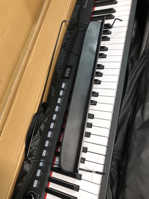 Photo 4 of **USED/SEE NOTES**Starfavor Piano Keyboard 88 Keys Keyboard Electronic Keyboard Piano with Semi-weighted Keys, Keyboard Stand, Sustain Pedal, and Carrying Case Black