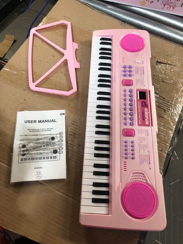 Photo 2 of **SEE NOTES**
WOSTOO Kids Keyboard Piano, Portable 61 Keys Keyboard Electronic Digital Piano - Pink