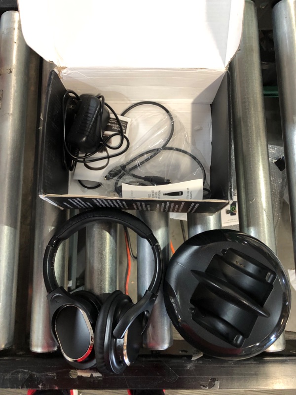 Photo 1 of Wireless TV Headphones with Charging Dock Over-Ear RF TV Headset 2.4GHz Transmitter + 330 ft. Max Signal Range Light Weight and Extra Padding for Superior Comfort Easy Set Up 6 Hour Battery Life