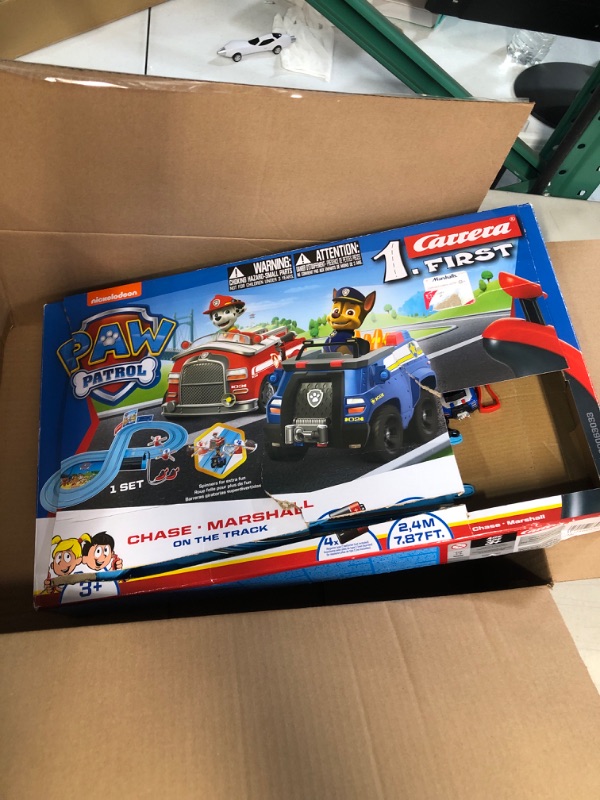 Photo 2 of Carrera First Paw Patrol - Slot Car Race Track - Includes 2 Cars: Chase and Marshall - Battery-Powered Beginner Racing Set for Kids Ages 3 Years and Up