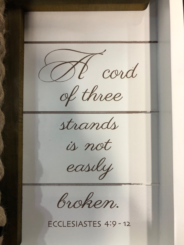 Photo 1 of A Cord of Three Strands Cross Sign