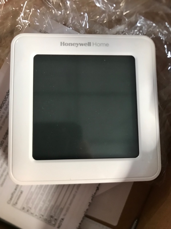 Photo 2 of **SEE NOTES**
Honeywell Home RTH8560D 7 Day Programmable Touchscreen Thermostat