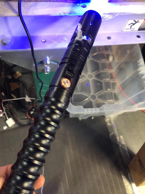 Photo 1 of CVCBSER FX Dueling Lightsaber RGB 12 Colors Changeable Premium Aluminium Alloy Hilt Light Saber with 9 Mode Sound Force Lightsaber Toys (Black)