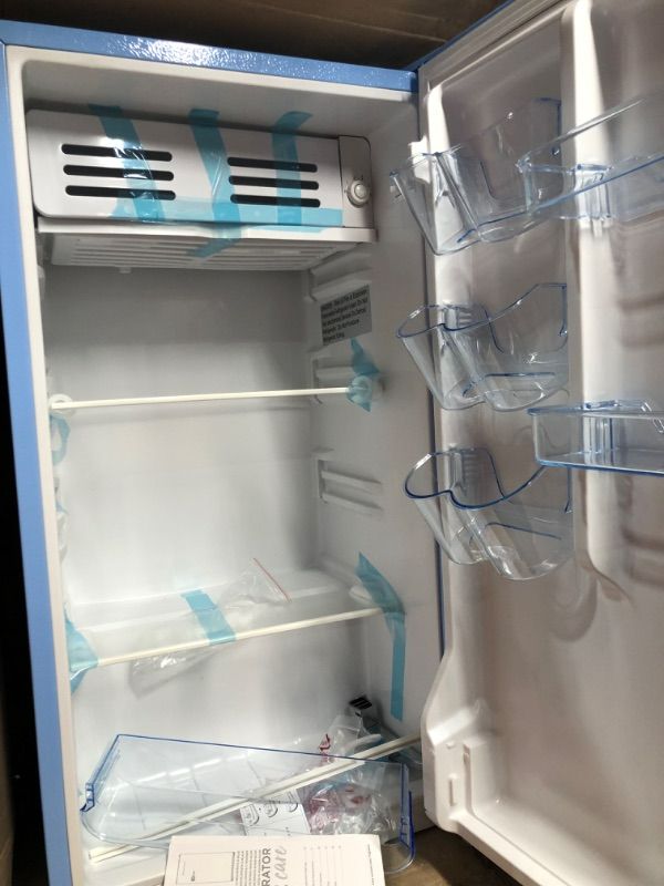 Photo 4 of **PARTS ONLY, MAJOR DAMAGE TOO HOUSING** 
RIGIDAIRE EFR376-BLUE 3.2 CU FT BLUE RETRO BAR FRIDGE WITH SIDE BOTTLE OPENER
