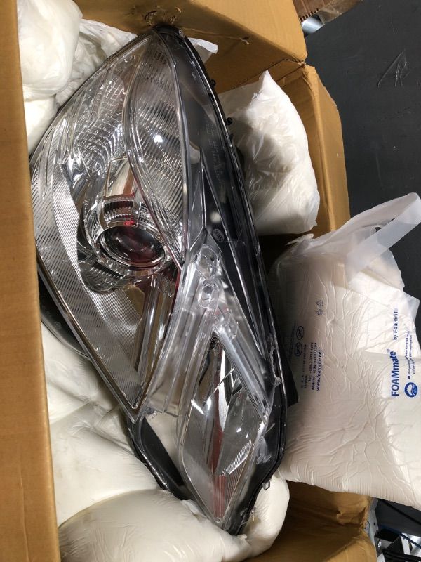 Photo 2 of **PARTS ONLY**
TYC LEFT HEADLIGHT ASSEMBLY COMPATIBLE WITH 2010-2013 MERCEDES BENZ E-CLASS
