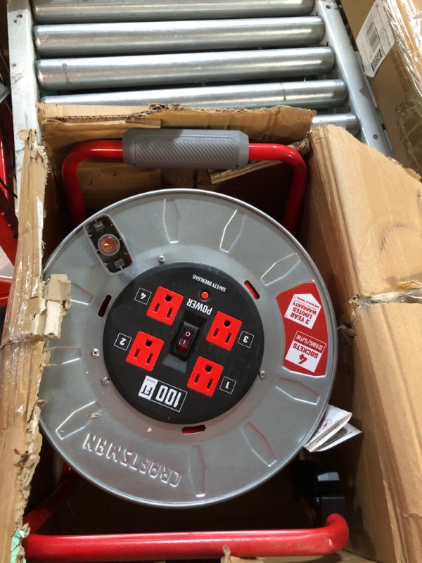 Photo 1 of CRAFTSMAN 100 Ft. Contractor Retractable Extension Cord Reel With 4 Outlets & Heavy Duty 12AWG SJTW Cable