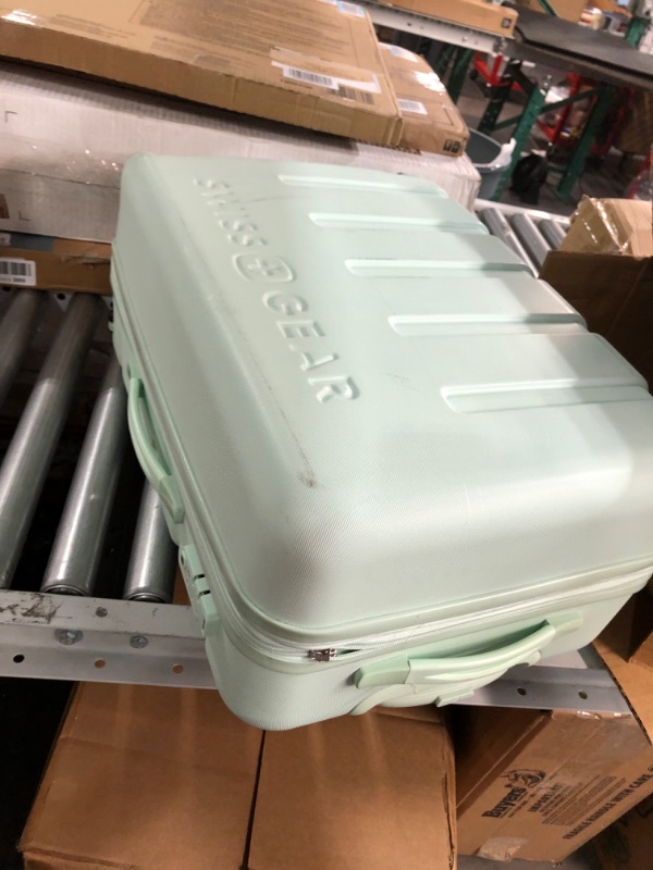Photo 1 of **DAMAGED ZIPPER - SEE PHOTOS**
SwissGear 7366 Hardside Expandable Luggage, 23-Inch Clearly Aqua
