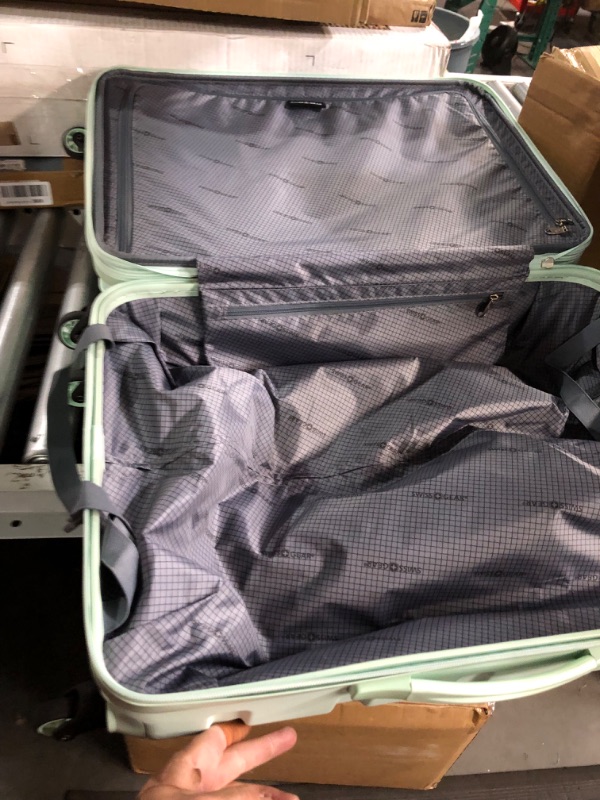 Photo 3 of **DAMAGED ZIPPER - SEE PHOTOS**
SwissGear 7366 Hardside Expandable Luggage, 23-Inch Clearly Aqua